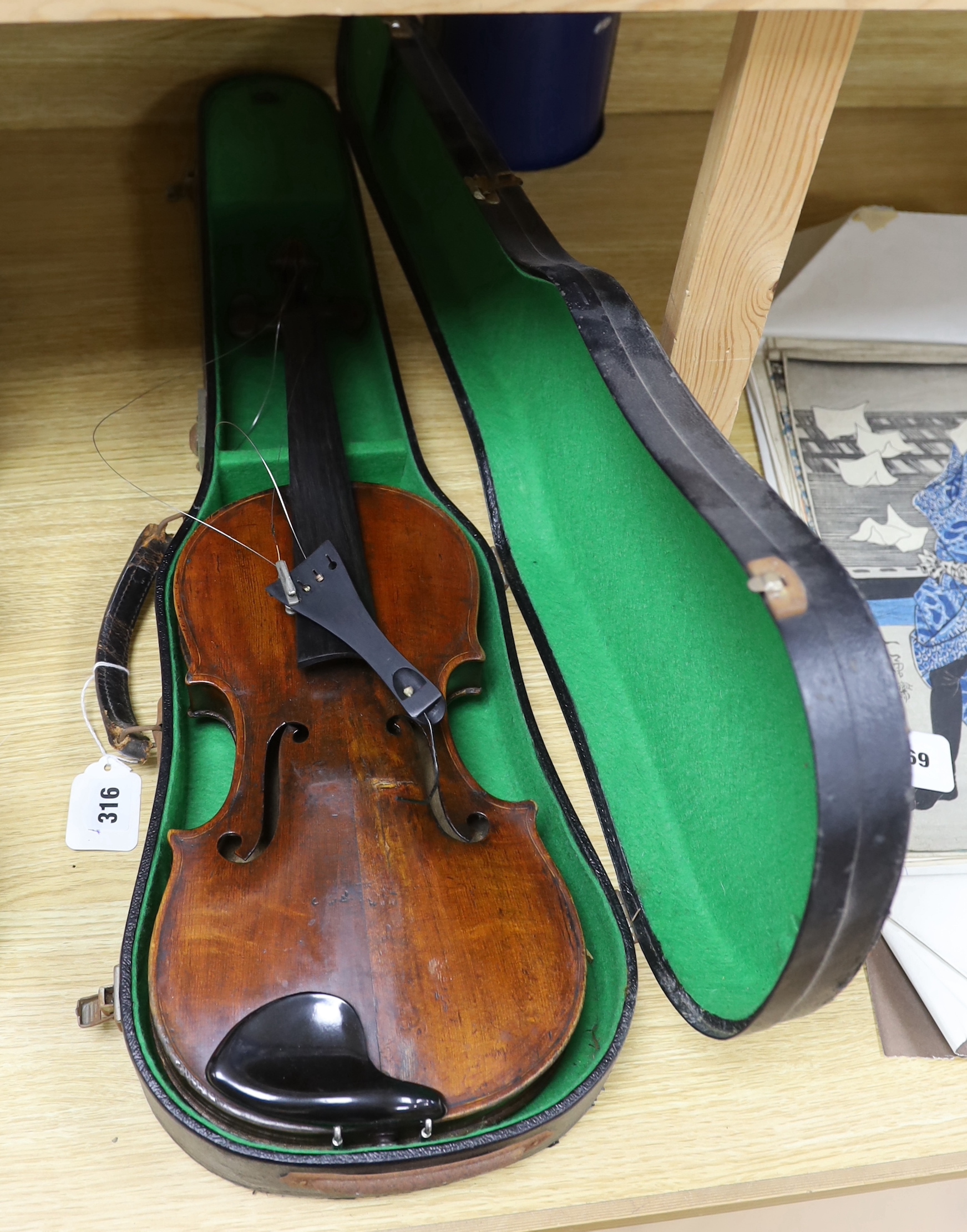 A violin labelled 'Albani Palermo', cased, length of back 35.5cm